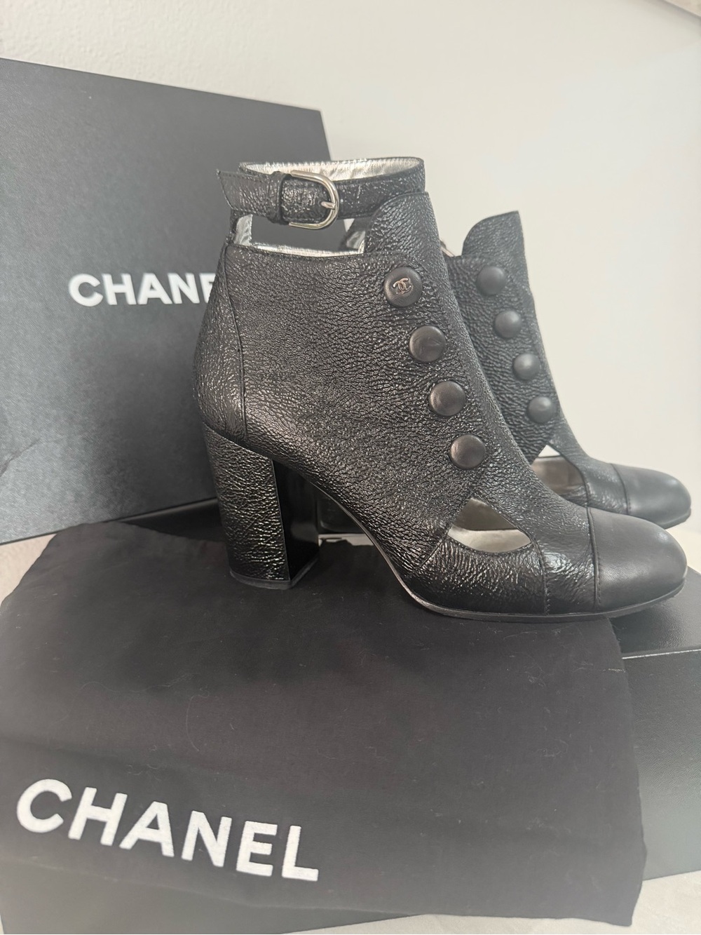 CHANEL Black Leather Cutout Button Ankle Boots
